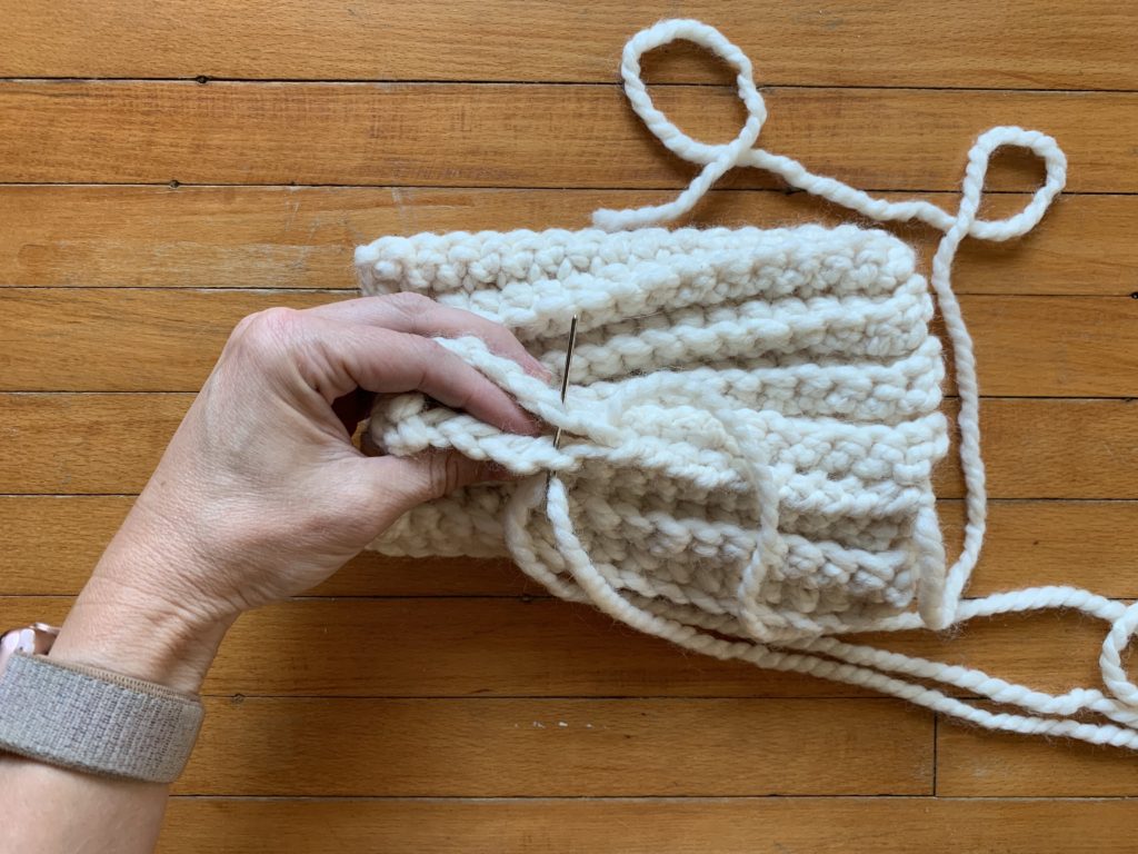 Whip stitch your rectangles ends together.