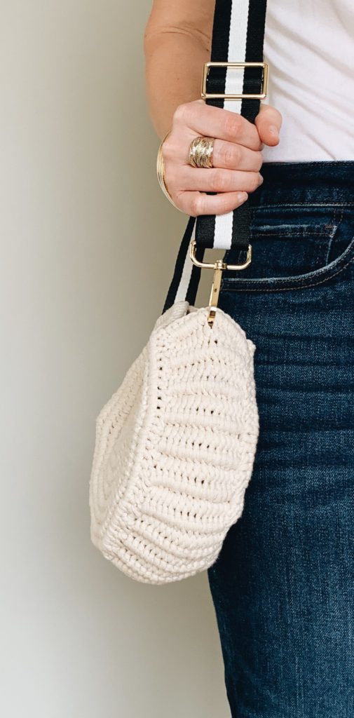 Close up look on how to attach a strap to your easy summer crochet bag.